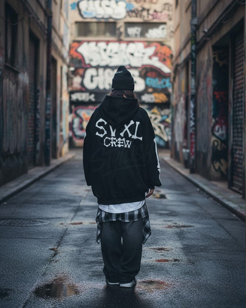  Oversized hoodie featuring skeleton-inspired bone graphics and bold back lettering 